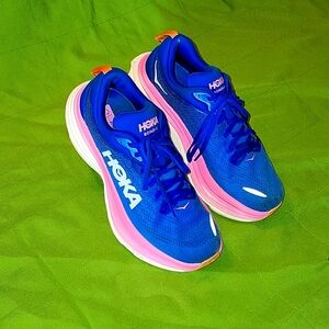 Size 9 pink, blue, white, and orange Hoka sneakers